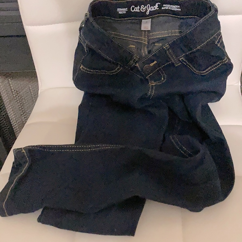 Dark blue Cat & Jack jeans. Fit long and straight. Stretch for play.
